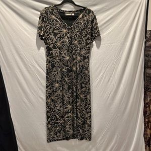 Black dress with gold flower pattern